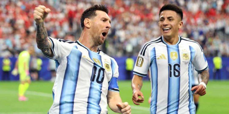 Argentina National Team Players Celebrate on the Field, Messi Wearing Number 10 Shouting with a Fist Raised As His Teammate Grins Nearby. › Guadalupa Ciudadana