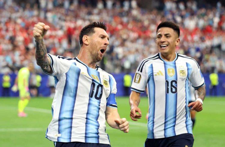 Argentina National Team Players Celebrate on the Field, Messi Wearing Number 10 Shouting with a Fist Raised As His Teammate Grins Nearby. › Guadalupa Ciudadana
