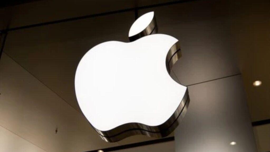 Large Illuminated Apple Logo Mounted on a Wall in a Retail Store Interior. Size and Glow Emphasize Brand Presence. › Guadalupa Ciudadana
